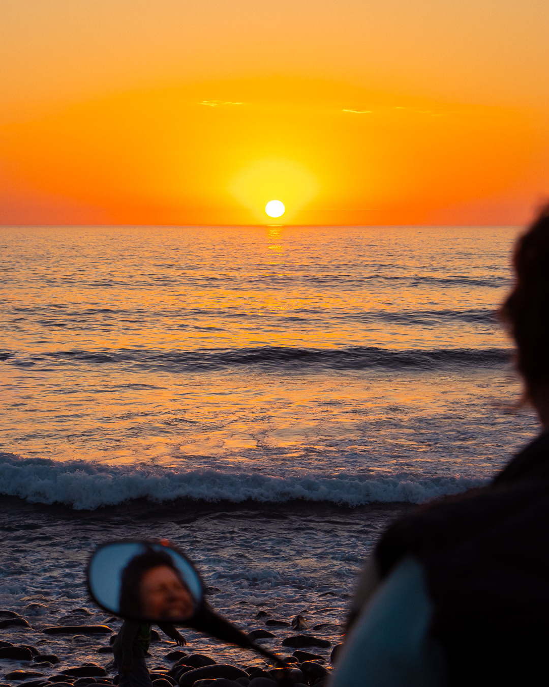 Sunset over Algarve ocean during ATV adventure